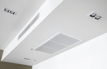 Ducted air conditioning vents installed in the ceiling for efficient cooling and heating in residential and commercial spaces.